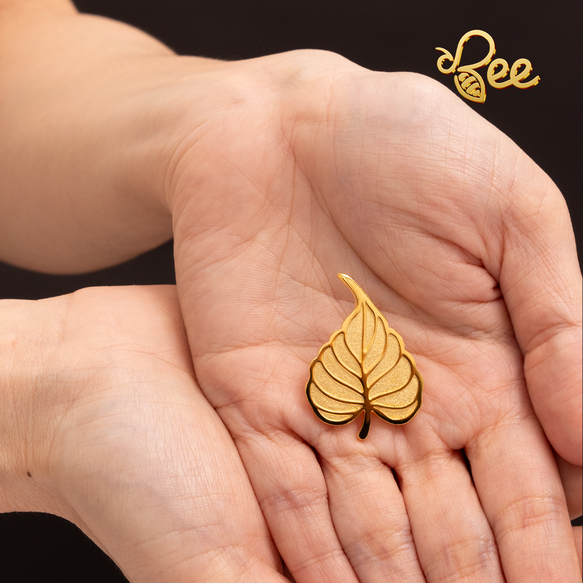 huy hiệu mạ vàng