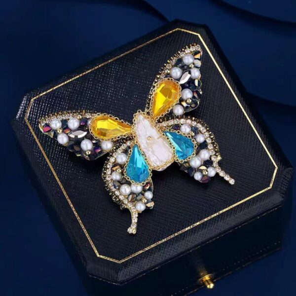 cài áo vest nữ hồ điệp cao cấp