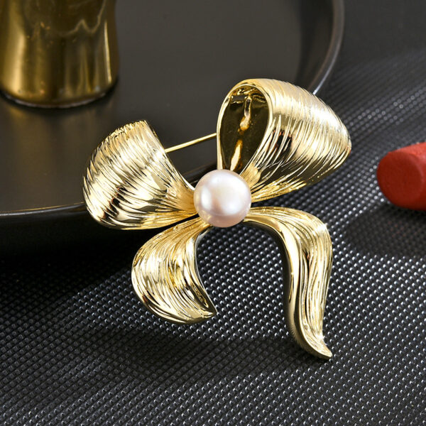 trâm cài áo dự tiệc hình nơ