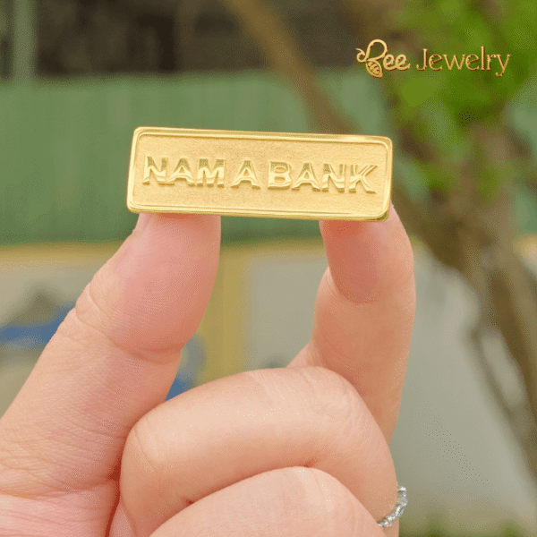 huy hiệu cài áo nam á bank mạ vàng