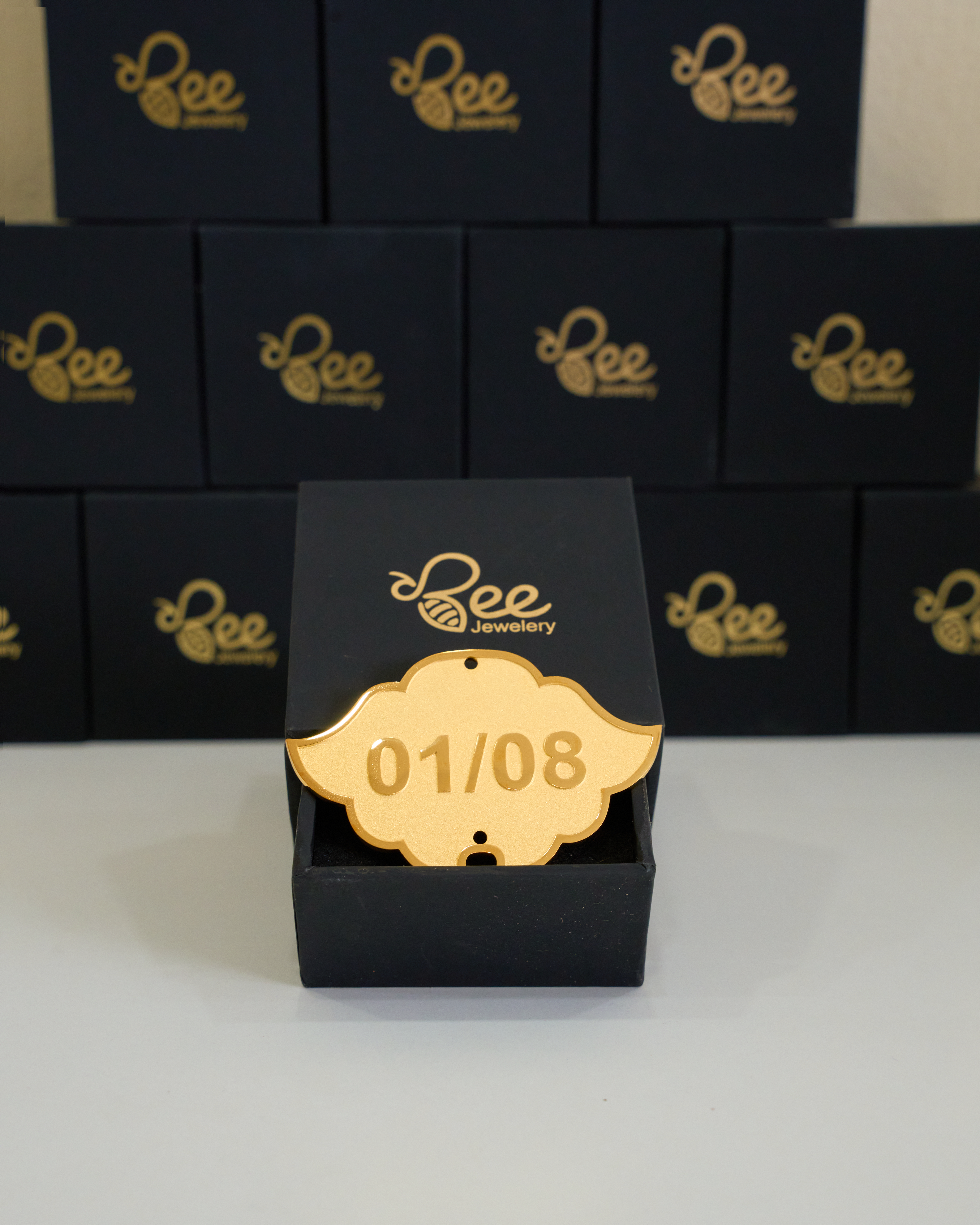 huy hiệu mạ vàng